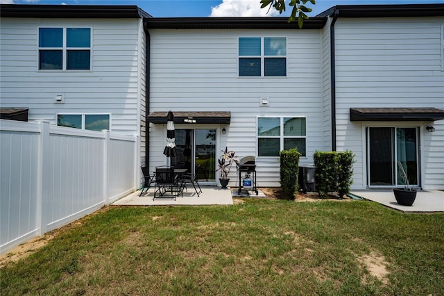1113 Merrill St, Davenport, FL 33837 - back of house featuring a patio area