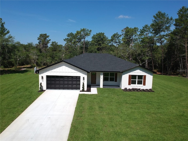 814 Gator Ln, Deltona, FL 32738 - view of front of property with an attached garage, a front lawn, and concrete driveway