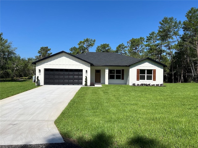 814 Gator Ln, Deltona, FL 32738 - view of front of house with a garage, a front lawn, and concrete driveway