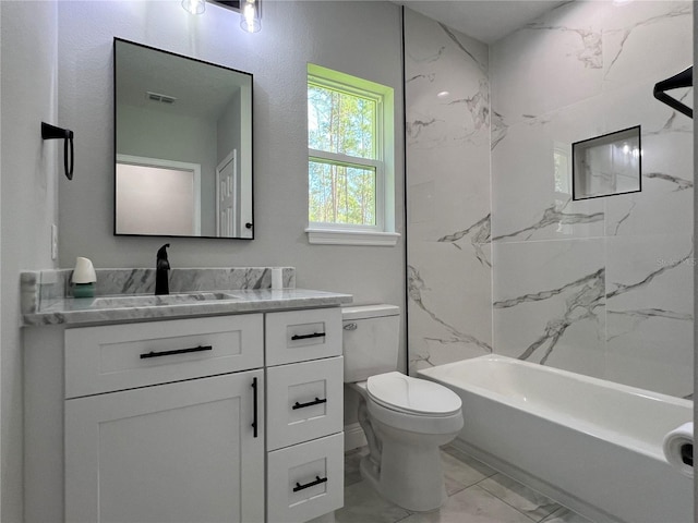 814 Gator Ln, Deltona, FL 32738 - full bath featuring marble finish floors, toilet, vanity, and washtub / shower combination