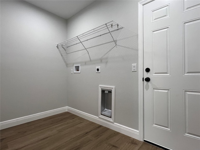 814 Gator Ln, Deltona, FL 32738 - washroom with hookup for a washing machine, dark wood-style flooring, and baseboards