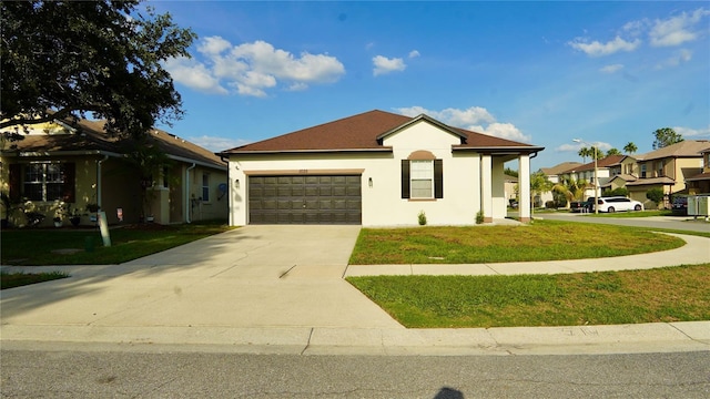 1025 Belvoir Dr, Kissimmee, FL 34744 - ranch-style house with a front lawn, stucco siding, an attached garage, concrete driveway, and a residential view