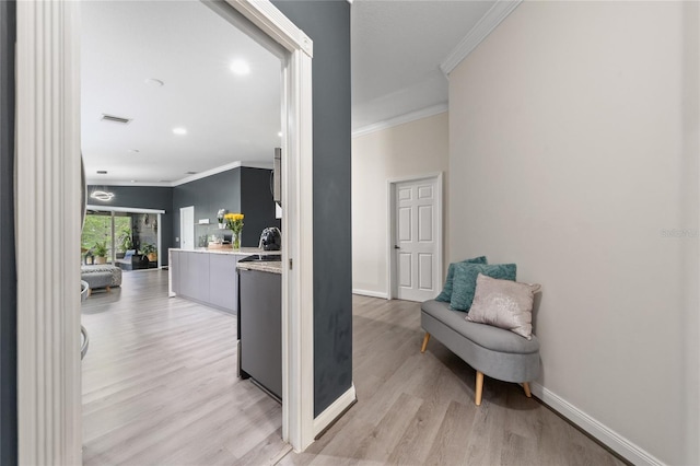 12041 Kajetan Ln, Orlando, FL 32827 - hall featuring crown molding, light wood finished floors, baseboards, and recessed lighting