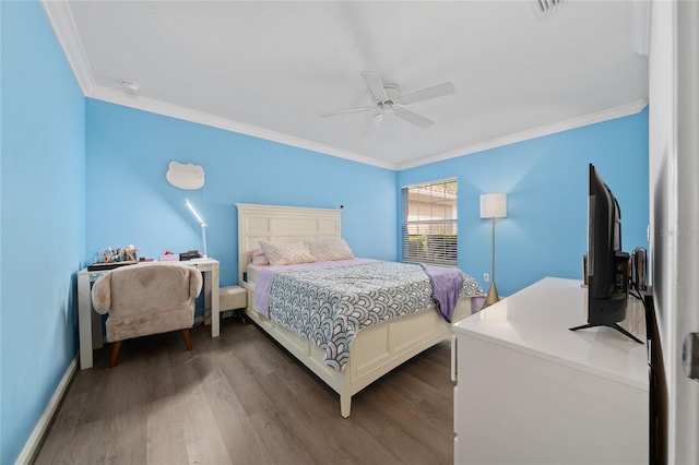 12041 Kajetan Ln, Orlando, FL 32827 - bedroom featuring wood finished floors, crown molding, baseboards, and a ceiling fan
