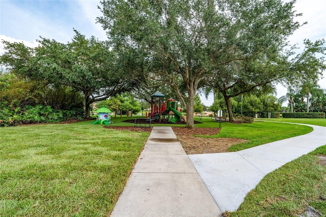12041 Kajetan Ln, Orlando, FL 32827 - surrounding community with a lawn
