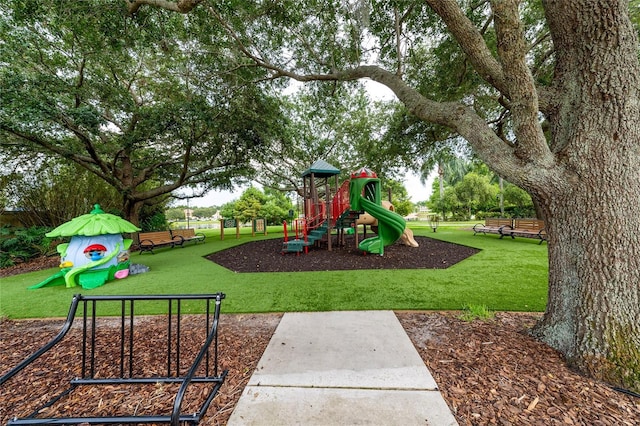 12041 Kajetan Ln, Orlando, FL 32827 - communal playground featuring a lawn