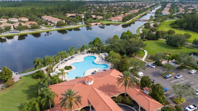 12041 Kajetan Ln, Orlando, FL 32827 - bird's eye view of a nearby body of water and a pool area