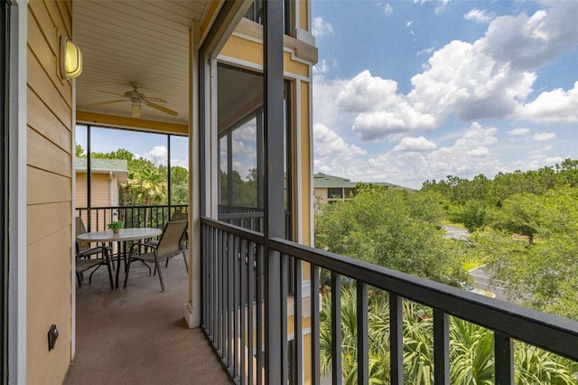 9055 Treasure Trove Ln Unit 409, Kissimmee, FL 34747 - balcony featuring a ceiling fan