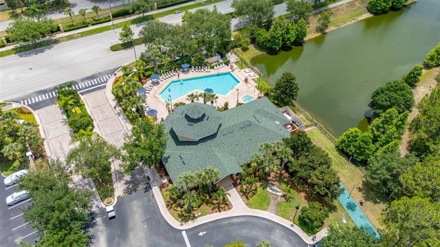 9055 Treasure Trove Ln Unit 409, Kissimmee, FL 34747 - aerial view of property's location featuring a pool and a large body of water