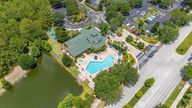 9055 Treasure Trove Ln Unit 409, Kissimmee, FL 34747 - drone / aerial view of a pool and a large body of water