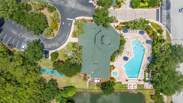 9055 Treasure Trove Ln Unit 409, Kissimmee, FL 34747 - aerial view of property's location with a pool and a nearby body of water