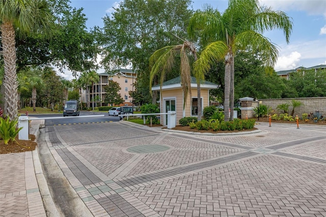 9055 Treasure Trove Ln Unit 409, Kissimmee, FL 34747 - view of decorative street featuring curbs