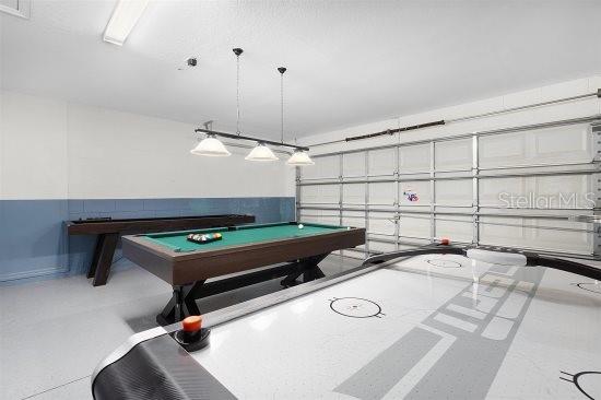 252 Barbera Dr, Davenport, FL 33897 - game room with pool table and a garage