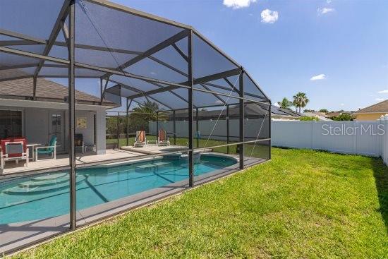 252 Barbera Dr, Davenport, FL 33897 - view of pool with glass enclosure and a patio