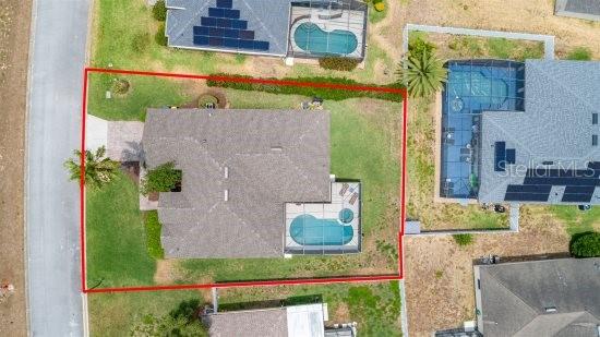 252 Barbera Dr, Davenport, FL 33897 - aerial view of property and surrounding area with property boundaries highlighted and a pool