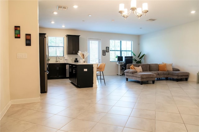 11378 Whistling Pine Way, Orlando, FL 32832 - living area featuring a chandelier, recessed lighting, baseboards, a desk, and light tile patterned flooring