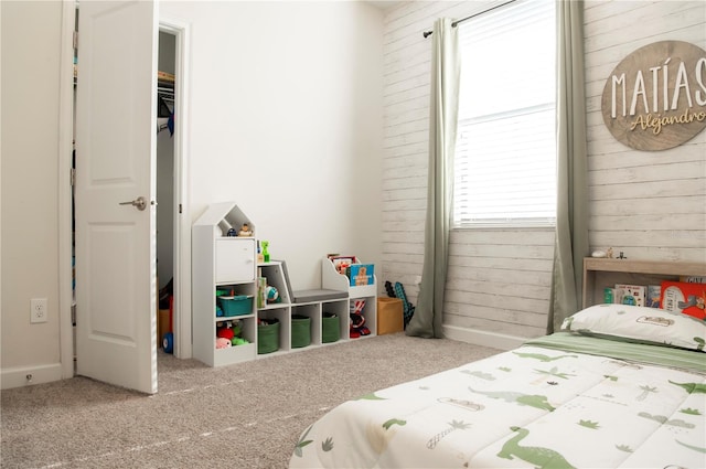 11378 Whistling Pine Way, Orlando, FL 32832 - bedroom featuring wooden walls and carpet