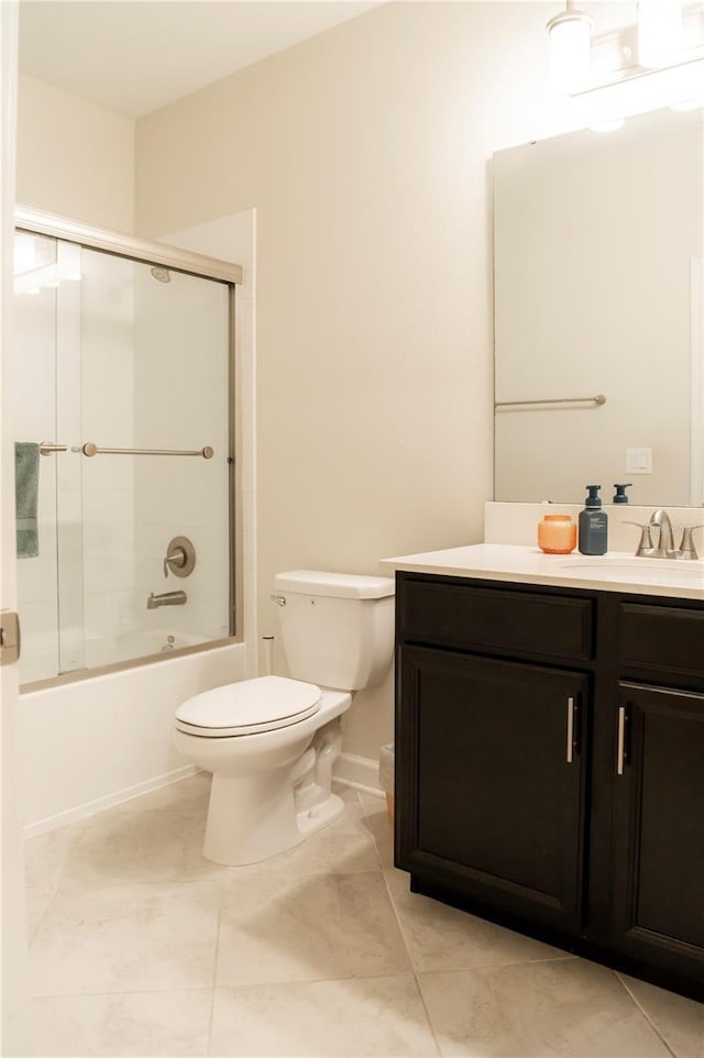 11378 Whistling Pine Way, Orlando, FL 32832 - full bath with toilet, vanity, bath / shower combo with glass door, and tile patterned floors