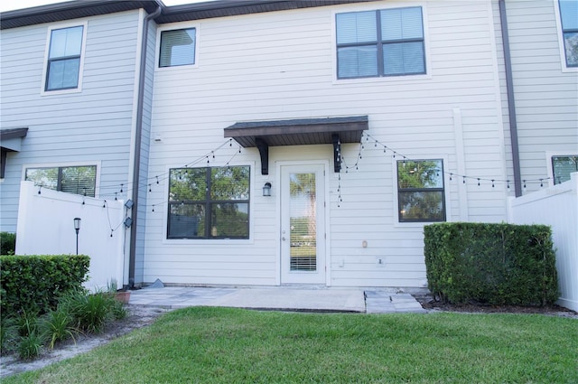 11378 Whistling Pine Way, Orlando, FL 32832 - back of property with a yard and a patio area