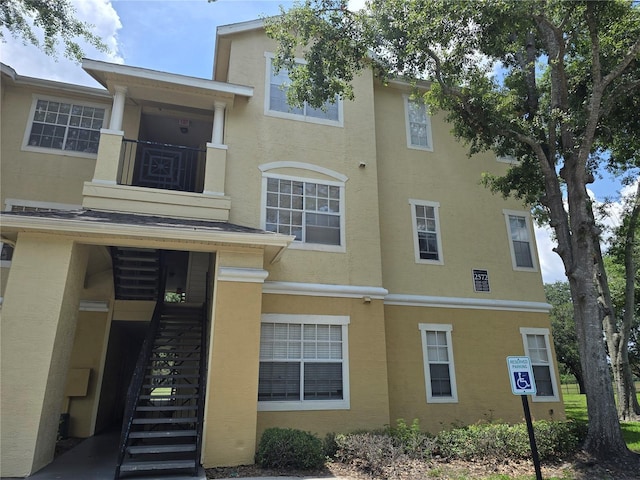 2572 Robert Trent Jones Dr Unit 1227, Orlando, FL 32835 - view of property with stairs