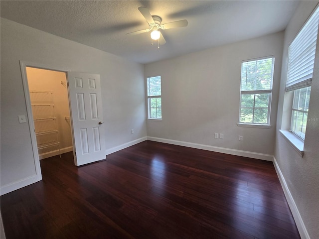 2572 Robert Trent Jones Dr Unit 1227, Orlando, FL 32835 - unfurnished room featuring ceiling fan, wood finished floors, and baseboards