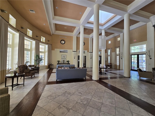 2572 Robert Trent Jones Dr Unit 1227, Orlando, FL 32835 - common area featuring a high ceiling, beamed ceiling, coffered ceiling, and ornamental molding