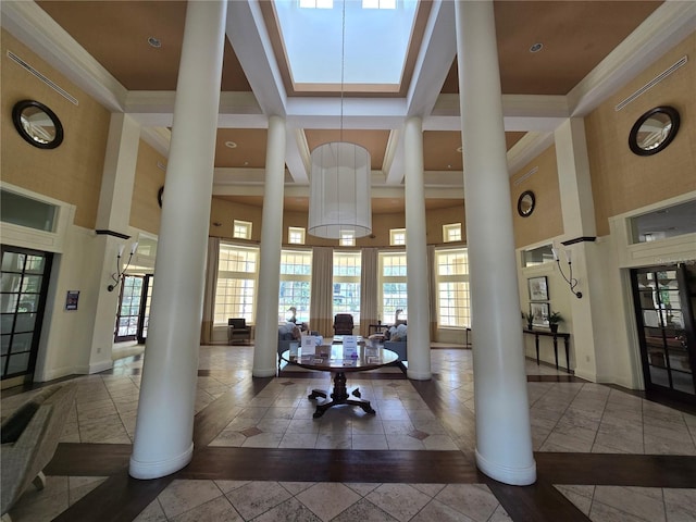 2572 Robert Trent Jones Dr Unit 1227, Orlando, FL 32835 - common area featuring a towering ceiling and crown molding