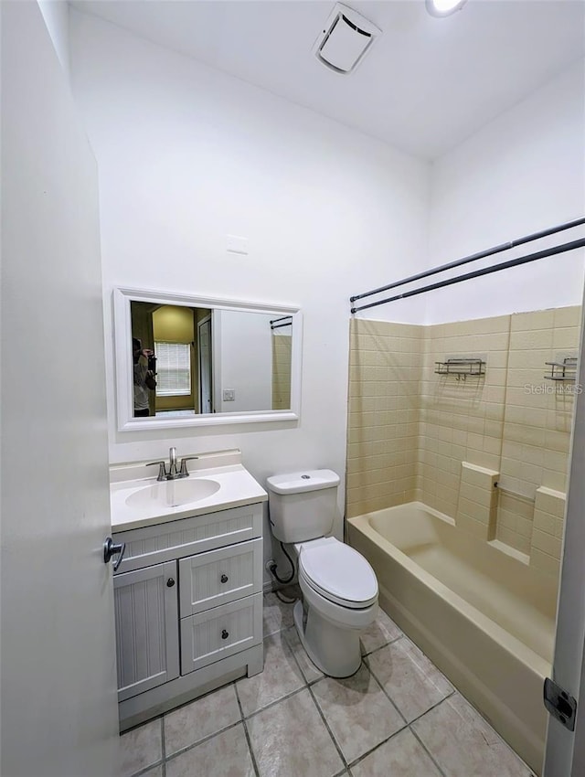 13940 Corrine Key Pl, Orlando, FL 32824 - bathroom with toilet, vanity, and bathing tub / shower combination