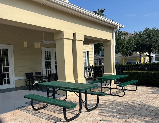 4008 San Gallo Dr Unit 106, Kissimmee, FL 34741 - view of patio / terrace with a ceiling fan and outdoor dining space