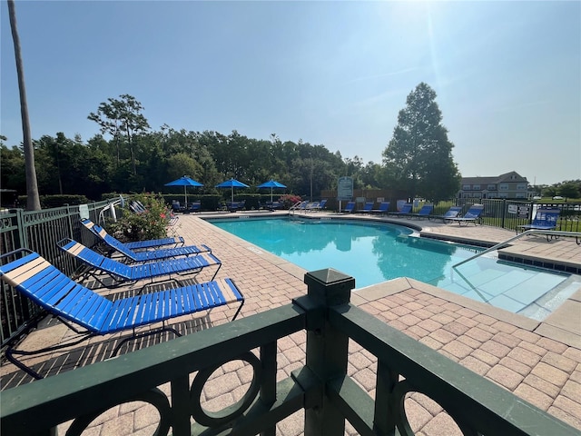 4008 San Gallo Dr Unit 106, Kissimmee, FL 34741 - community pool featuring a patio area
