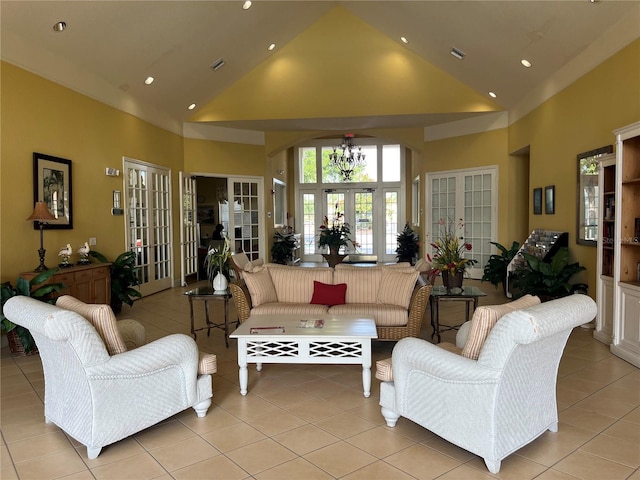 4008 San Gallo Dr Unit 106, Kissimmee, FL 34741 - living area with high vaulted ceiling, french doors, light tile patterned flooring, and recessed lighting