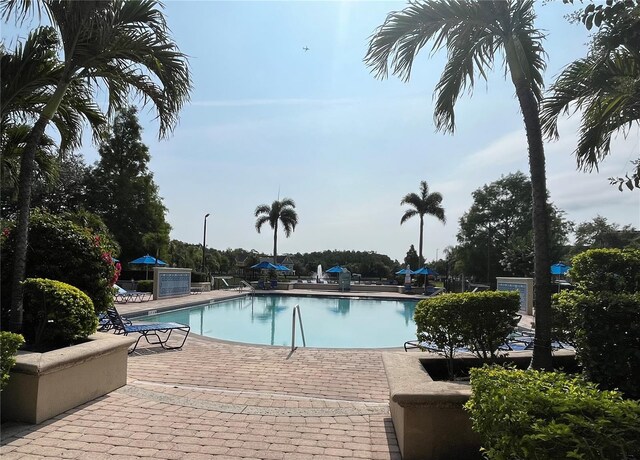 4008 San Gallo Dr Unit 106, Kissimmee, FL 34741 - community pool with a patio