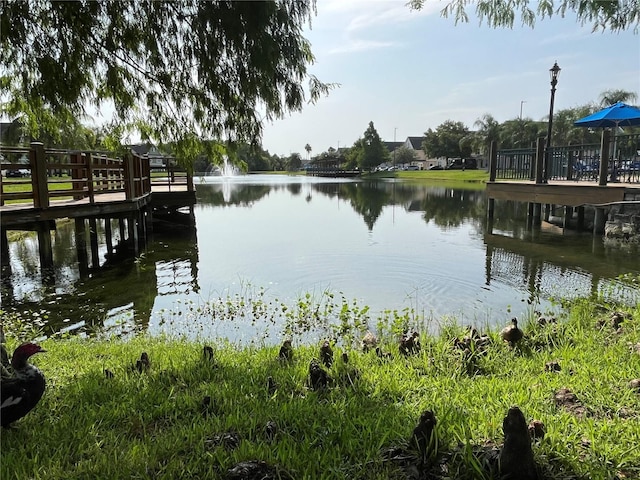 4008 San Gallo Dr Unit 106, Kissimmee, FL 34741 - dock area featuring a water view