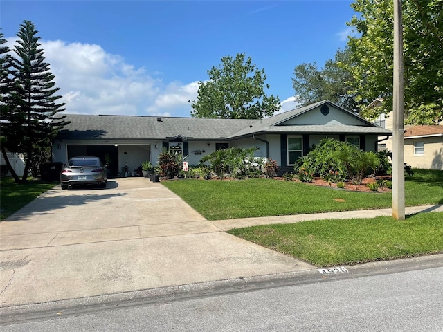 4926 Reginald Rd, Orlando, FL 32829 - single story home with a garage, a front lawn, and driveway