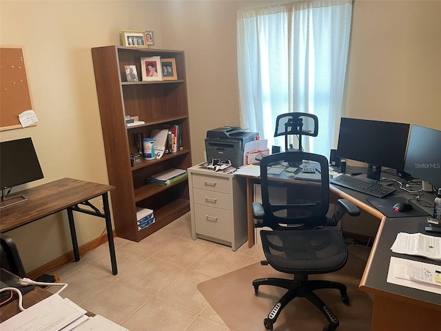 4926 Reginald Rd, Orlando, FL 32829 - home office featuring light tile patterned floors