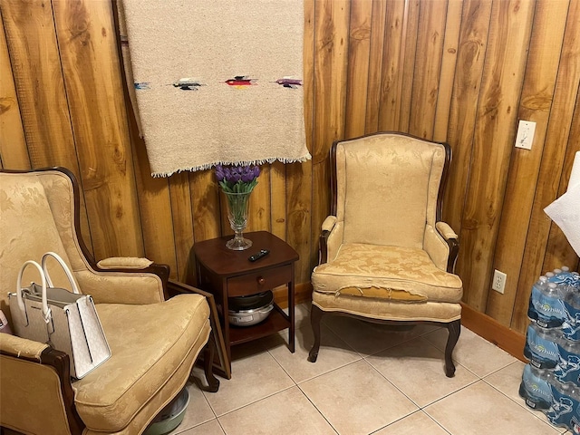 4926 Reginald Rd, Orlando, FL 32829 - sitting room with light tile patterned floors and wooden walls