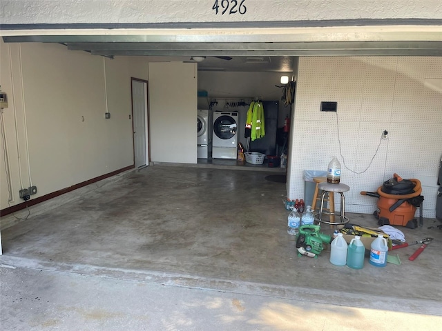 4926 Reginald Rd, Orlando, FL 32829 - garage with washer and clothes dryer