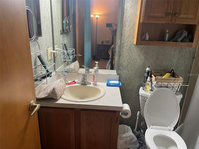 4926 Reginald Rd, Orlando, FL 32829 - half bath with vanity and toilet