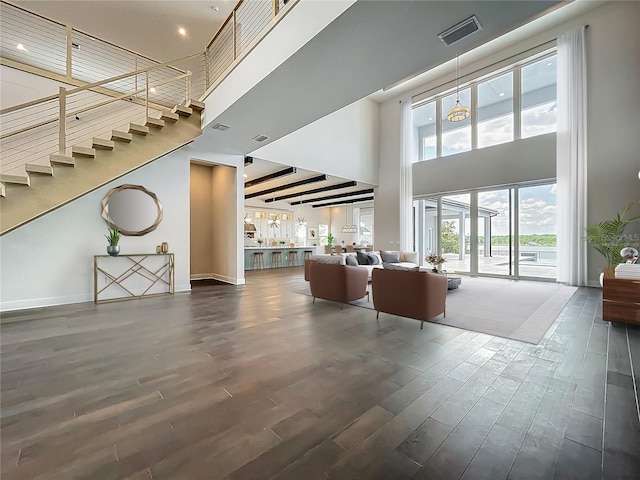 15121 Pendio Dr, Montverde, FL 34756 - lobby with a high ceiling, stairs, and recessed lighting