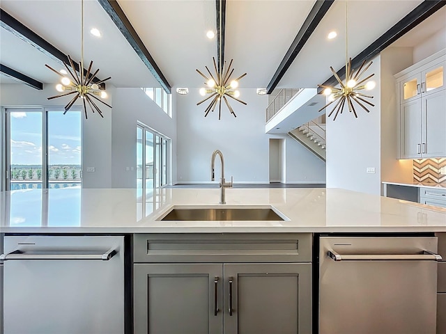 15121 Pendio Dr, Montverde, FL 34756 - kitchen with a chandelier, a sink, gray cabinetry, and recessed lighting