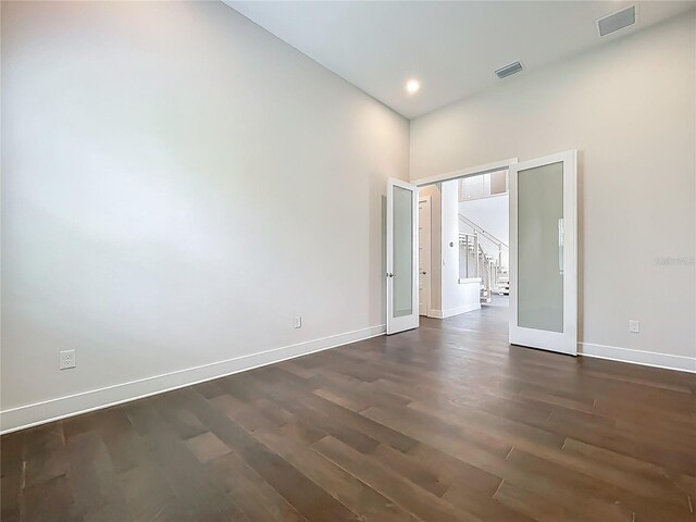15121 Pendio Dr, Montverde, FL 34756 - unfurnished room featuring baseboards, dark wood-style floors, and recessed lighting