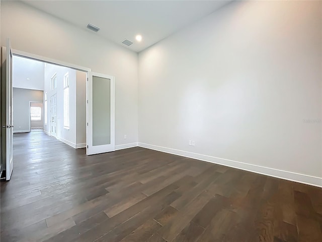 15121 Pendio Dr, Montverde, FL 34756 - empty room with baseboards and dark wood-style floors