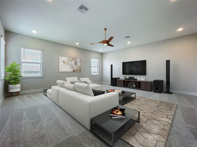 15121 Pendio Dr, Montverde, FL 34756 - living room featuring recessed lighting, a ceiling fan, baseboards, and light colored carpet