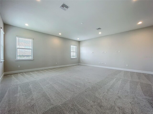 15121 Pendio Dr, Montverde, FL 34756 - unfurnished room with carpet floors, recessed lighting, and baseboards