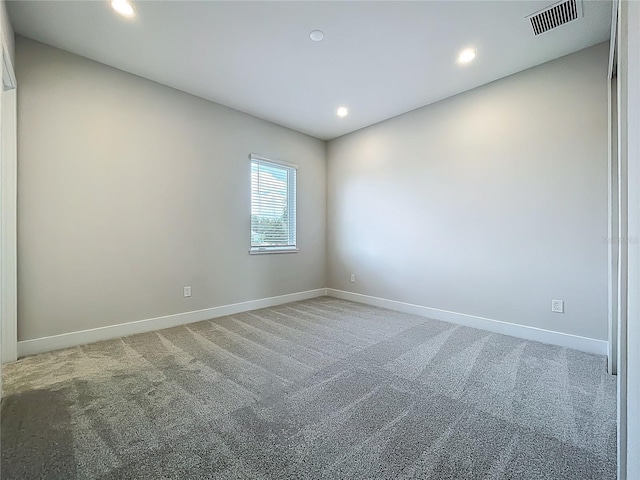 15121 Pendio Dr, Montverde, FL 34756 - unfurnished room with light carpet, baseboards, and recessed lighting