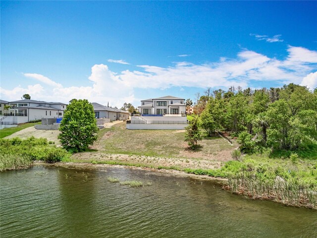 15121 Pendio Dr, Montverde, FL 34756 - rear view of house with a water view