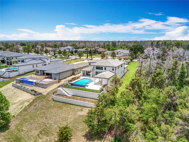 15121 Pendio Dr, Montverde, FL 34756 - aerial view of residential area with a pool area