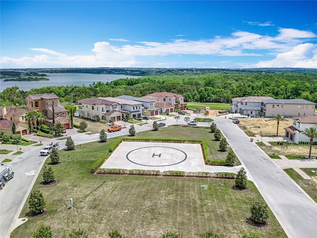 15121 Pendio Dr, Montverde, FL 34756 - bird's eye view of a nearby body of water and a forest