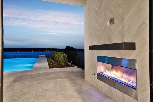 15121 Pendio Dr, Montverde, FL 34756 - view of swimming pool featuring a patio area