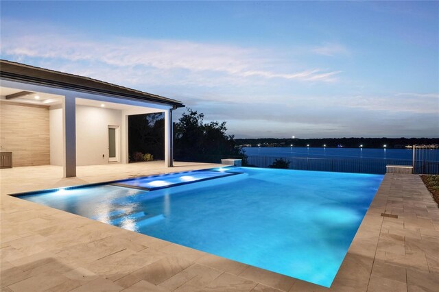 15121 Pendio Dr, Montverde, FL 34756 - view of swimming pool featuring a pool with connected hot tub and a patio area